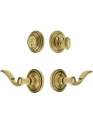 Grandeur Georgetown Entry Door Set, Keyed Alike with Bellagio Levers Left Handed in Antique Brass.